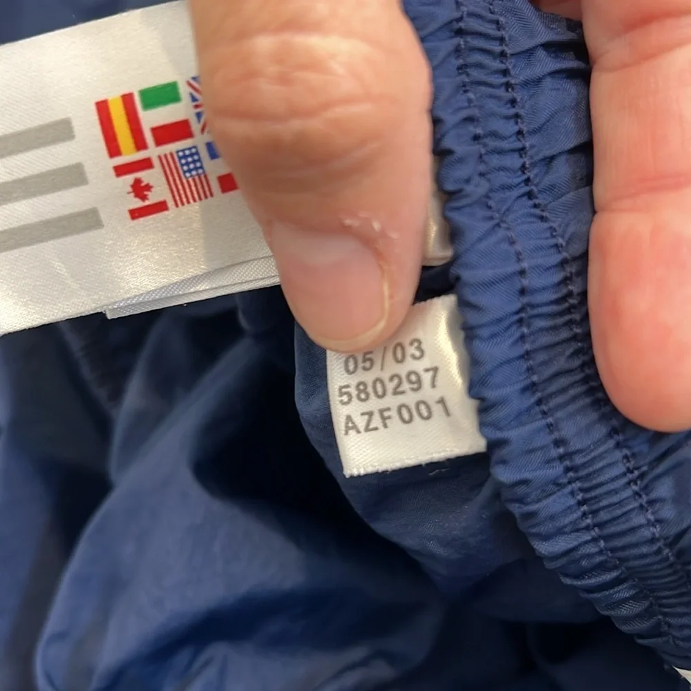 Adidas men’s Y2K Blue Jogger track pants with White Stripes size large.